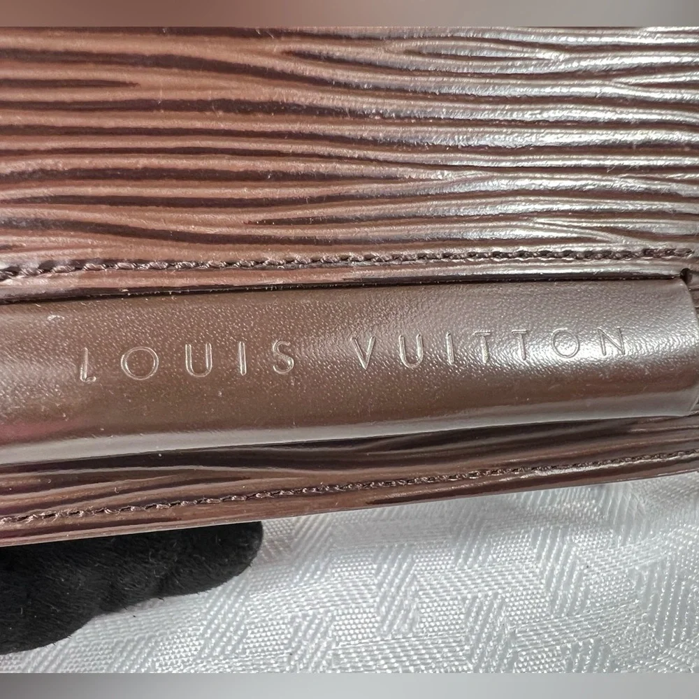 1083: Louis Vuitton Vintage Brown Epi Leather Compact Wallet